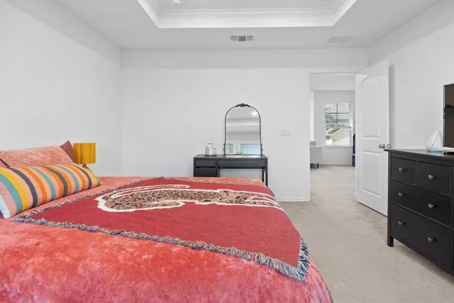 a bathroom with a sink vanity and a mirror