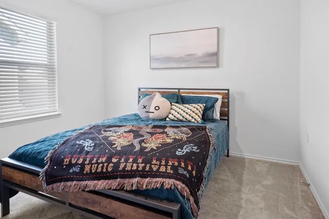 a bathroom with a sink and a large mirror