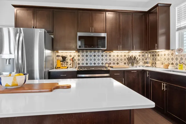a bathroom with a sink and a granite countertops