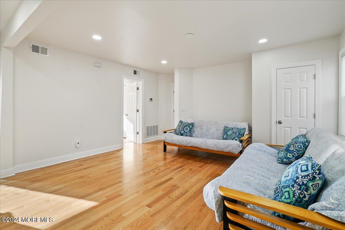 116 11th Avenue, Unit 2 Belmar, NJ 07719 - Photo 13 of 26 a living room with furniture