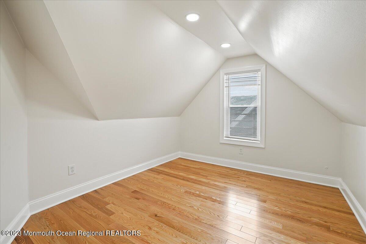 116 11th Avenue, Unit 2 Belmar, NJ 07719 - Photo 21 of 26 a view of an empty room and window