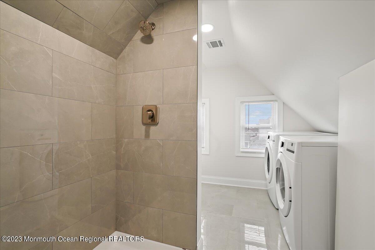 116 11th Avenue, Unit 2 Belmar, NJ 07719 - Photo 22 of 26 a bathroom with a shower
