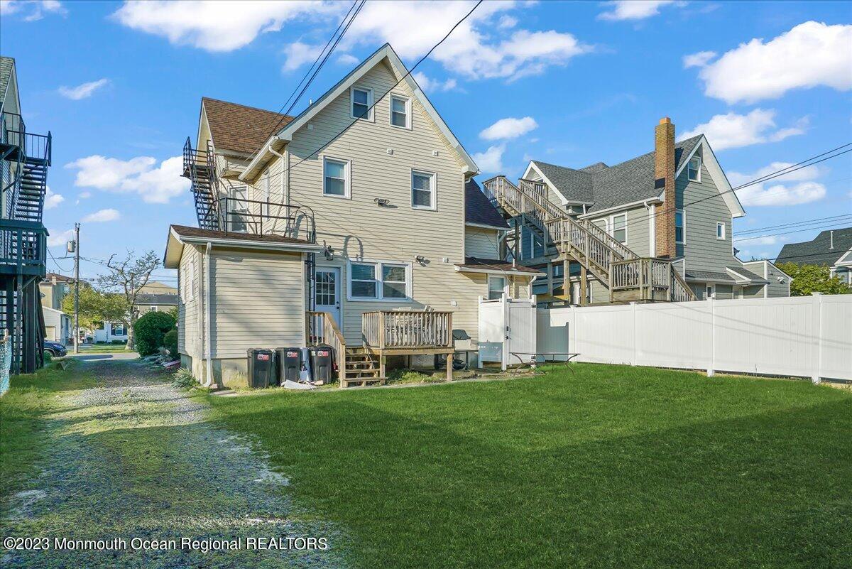 116 11th Avenue, Unit 2 Belmar, NJ 07719 - Photo 25 of 26 a view of an house with backyard space and garden
