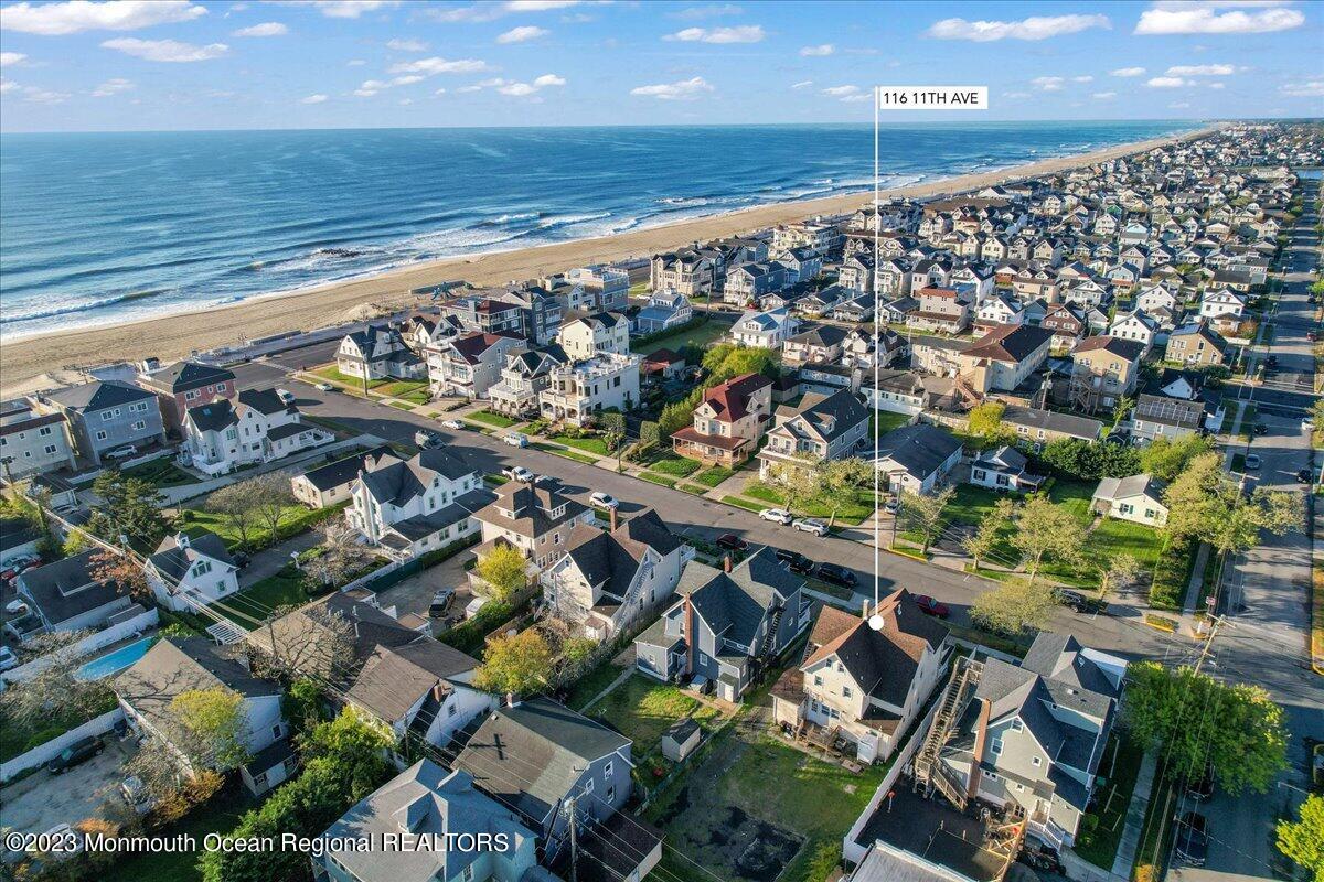 116 11th Avenue, Unit 2 Belmar, NJ 07719 - Photo 3 of 26 a city view with tall buildings