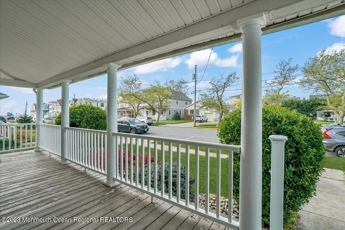 116 11th Avenue, Unit 2 Belmar, NJ 07719 - Photo 5 of 26 a view of a balcony with flower plants