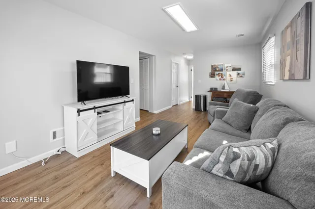 a view of a garage with a bike and white walls