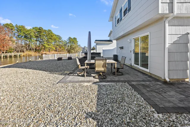 an aerial view of houses with outdoor space