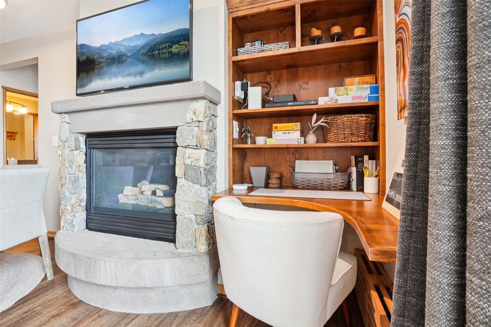 129 River Run Road, Unit 8055 Keystone, CO 80435 - Photo 2 of 50 Living room featuring wood finished floors and a fireplace