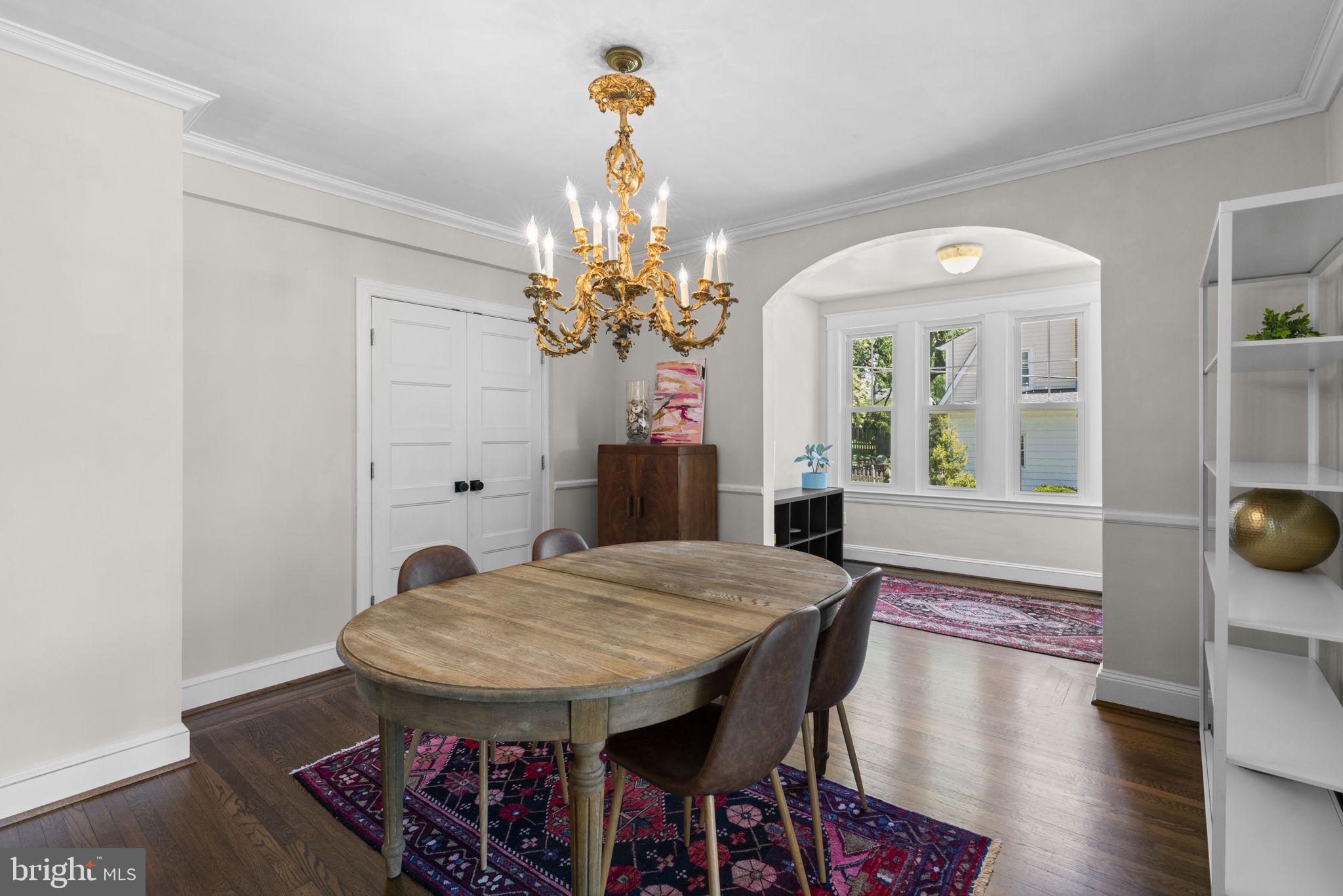 1022 Overbrook Road Baltimore, MD 21239 - Photo 11 of 39 Elegant dining space with vintage charm.