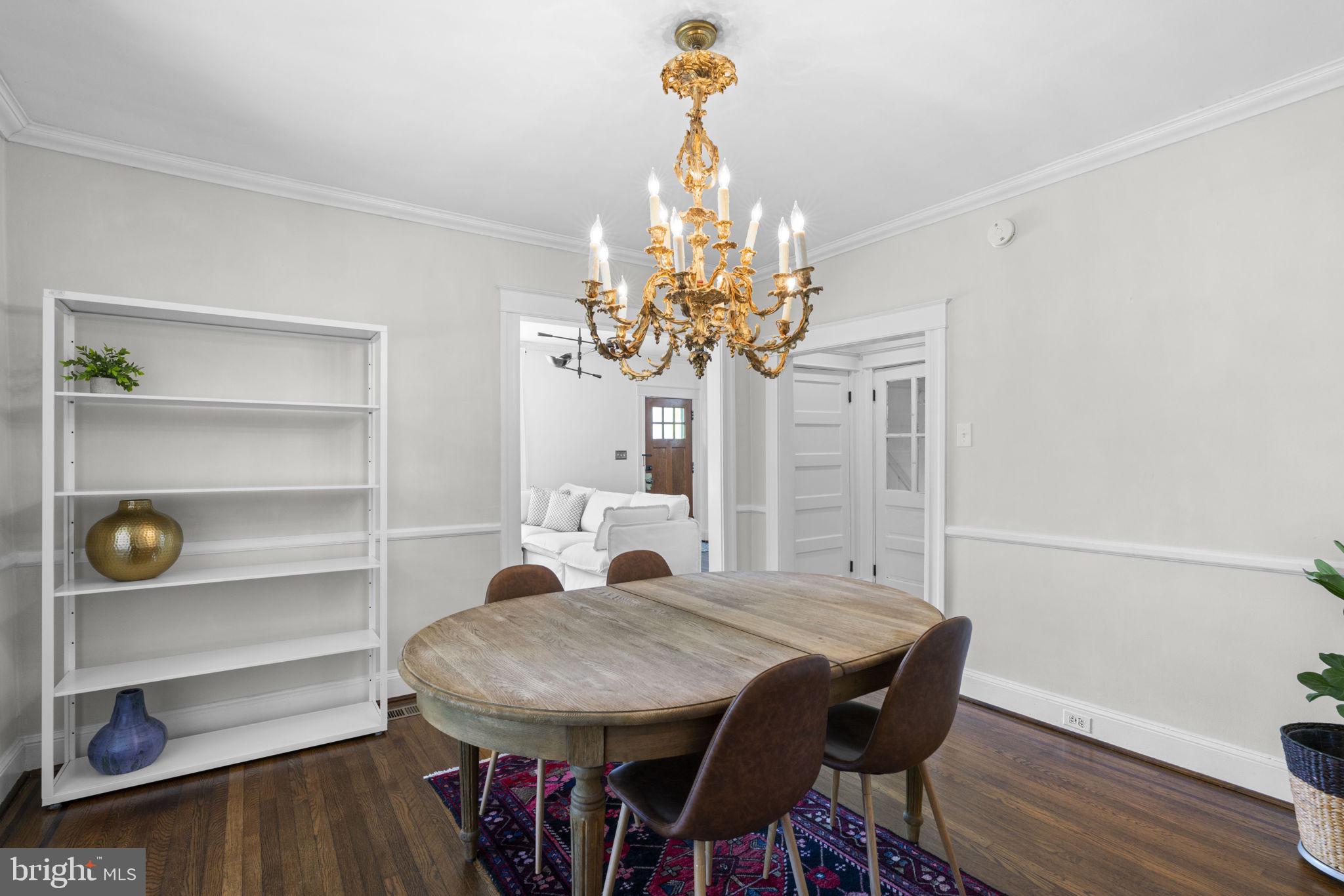 1022 Overbrook Road Baltimore, MD 21239 - Photo 12 of 39 Elegant dining space with vintage charm.