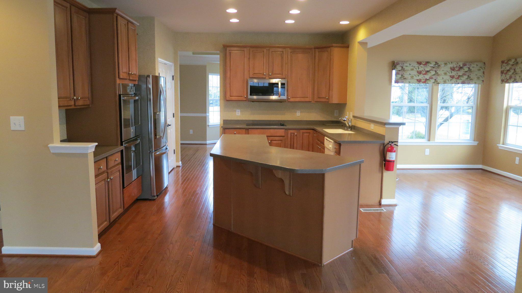 3 Lardner Road Burlington, NJ 08016 - Photo 7 of 28 Spacious kitchen with warm tones.