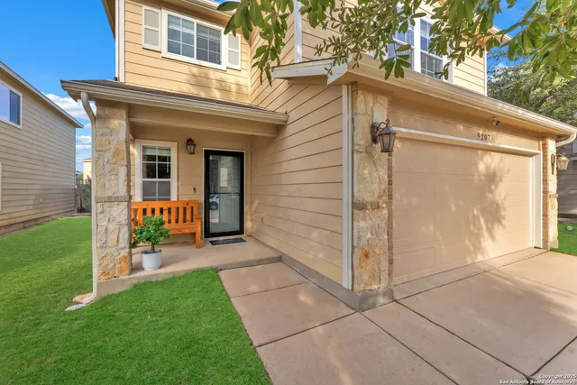 a view of a back yard of the house