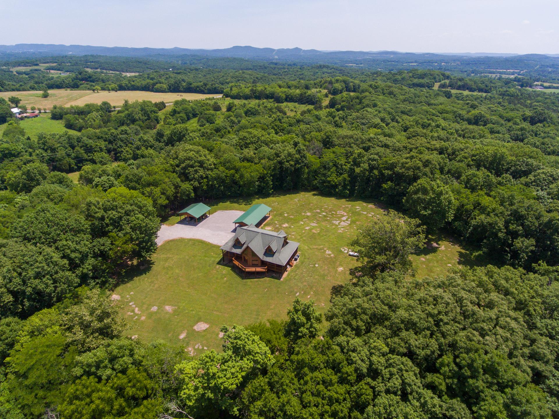 2267 Linwood Road Watertown, TN 37184 - Photo 1 of 30 a view of a lake with a mountain