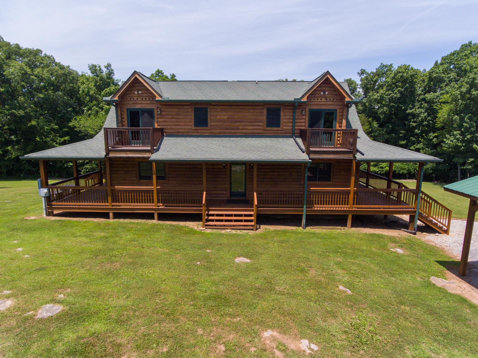 2267 Linwood Road Watertown, TN 37184 - Photo 8 of 30 a view of a house with a yard and sitting area
