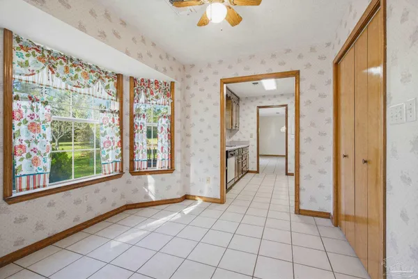 a view of an empty room and window
