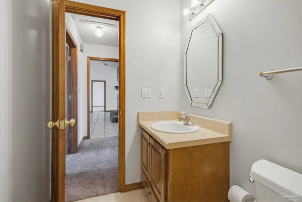 a view of wooden deck with a garden