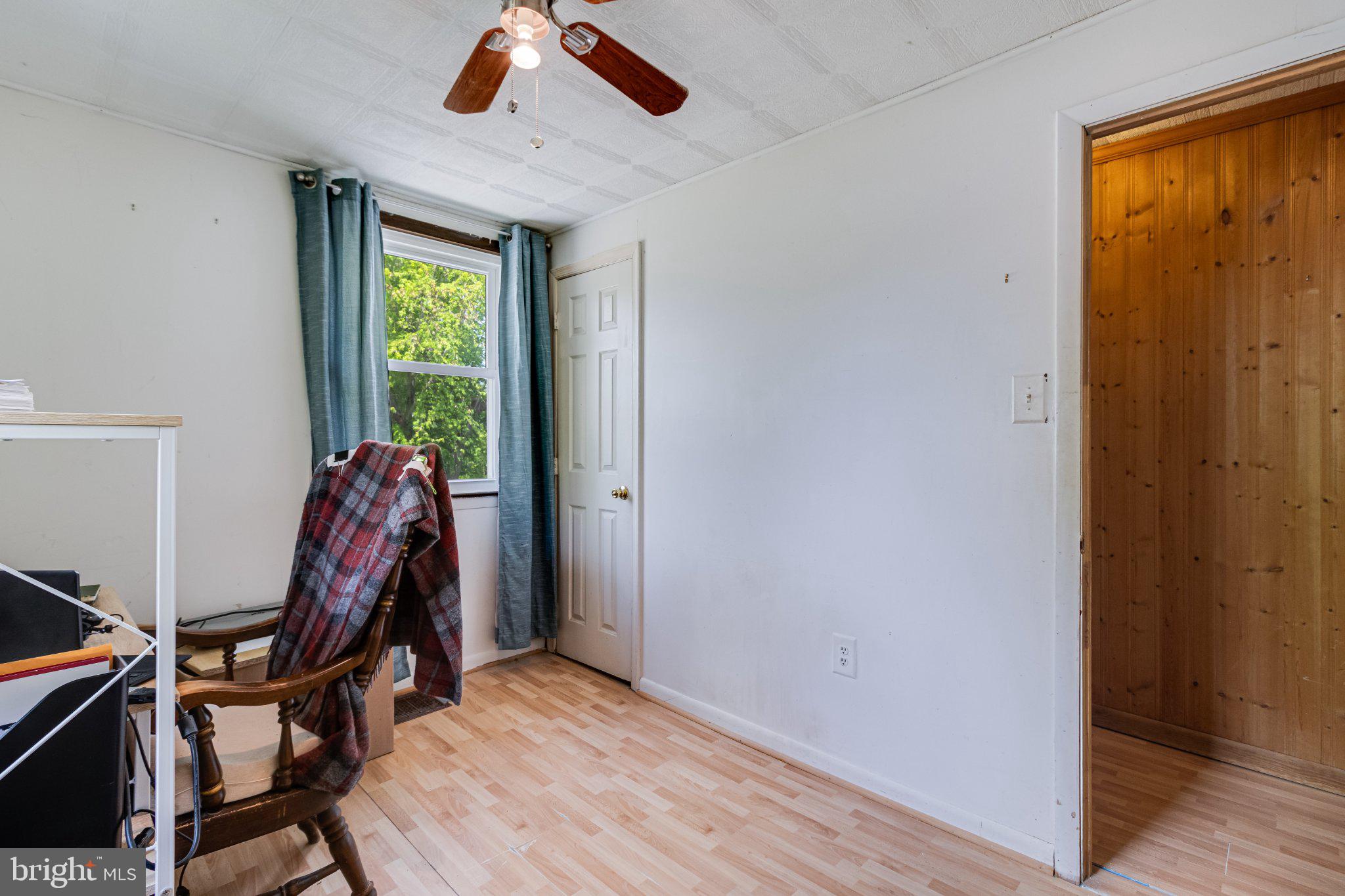 3925 Old Bayside Road Chesapeake Beach, MD 20732 - Photo 11 of 15 Bright and airy room with natural light.