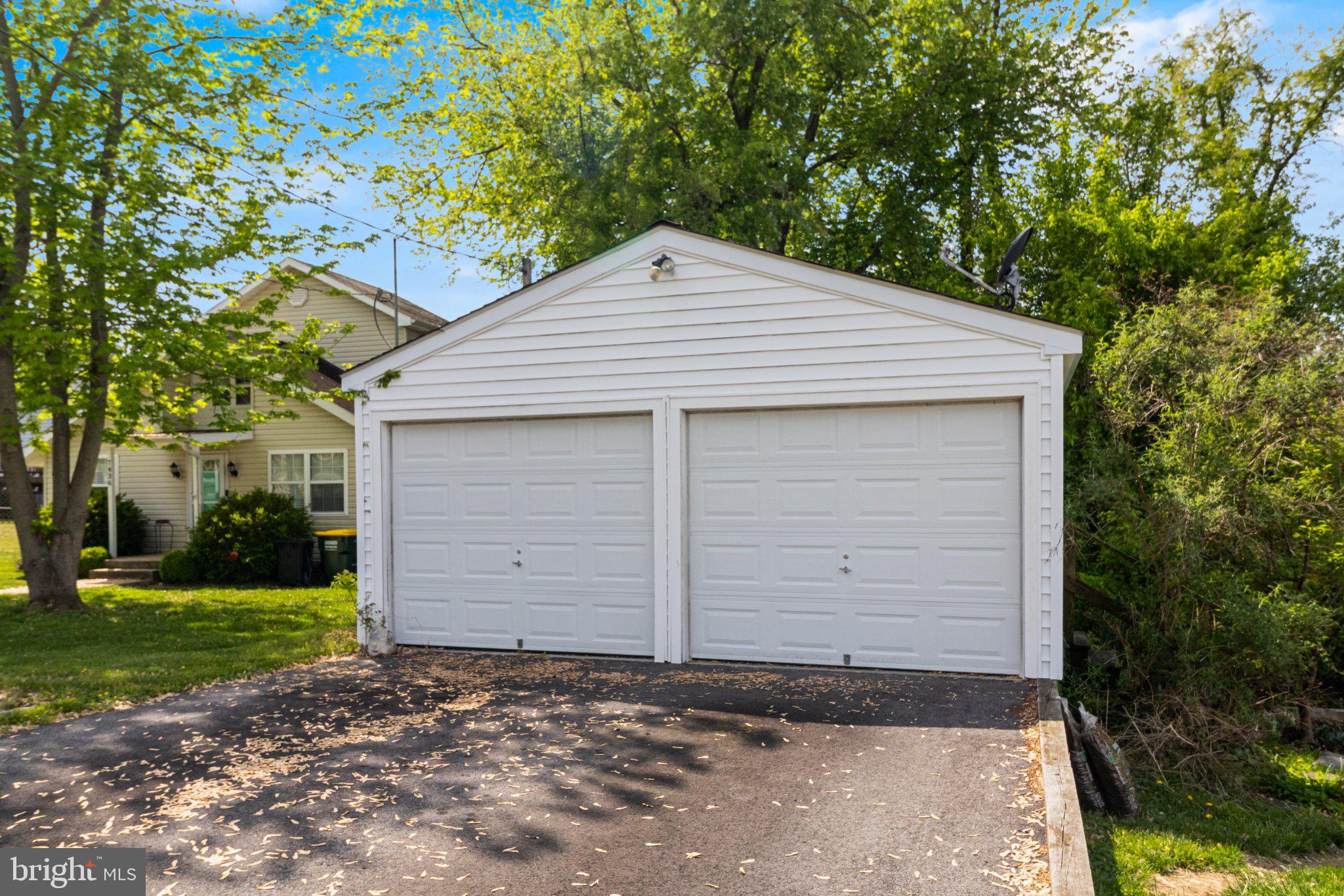 3925 Old Bayside Road Chesapeake Beach, MD 20732 - Photo 14 of 15 Charming dual garage in a serene setting.