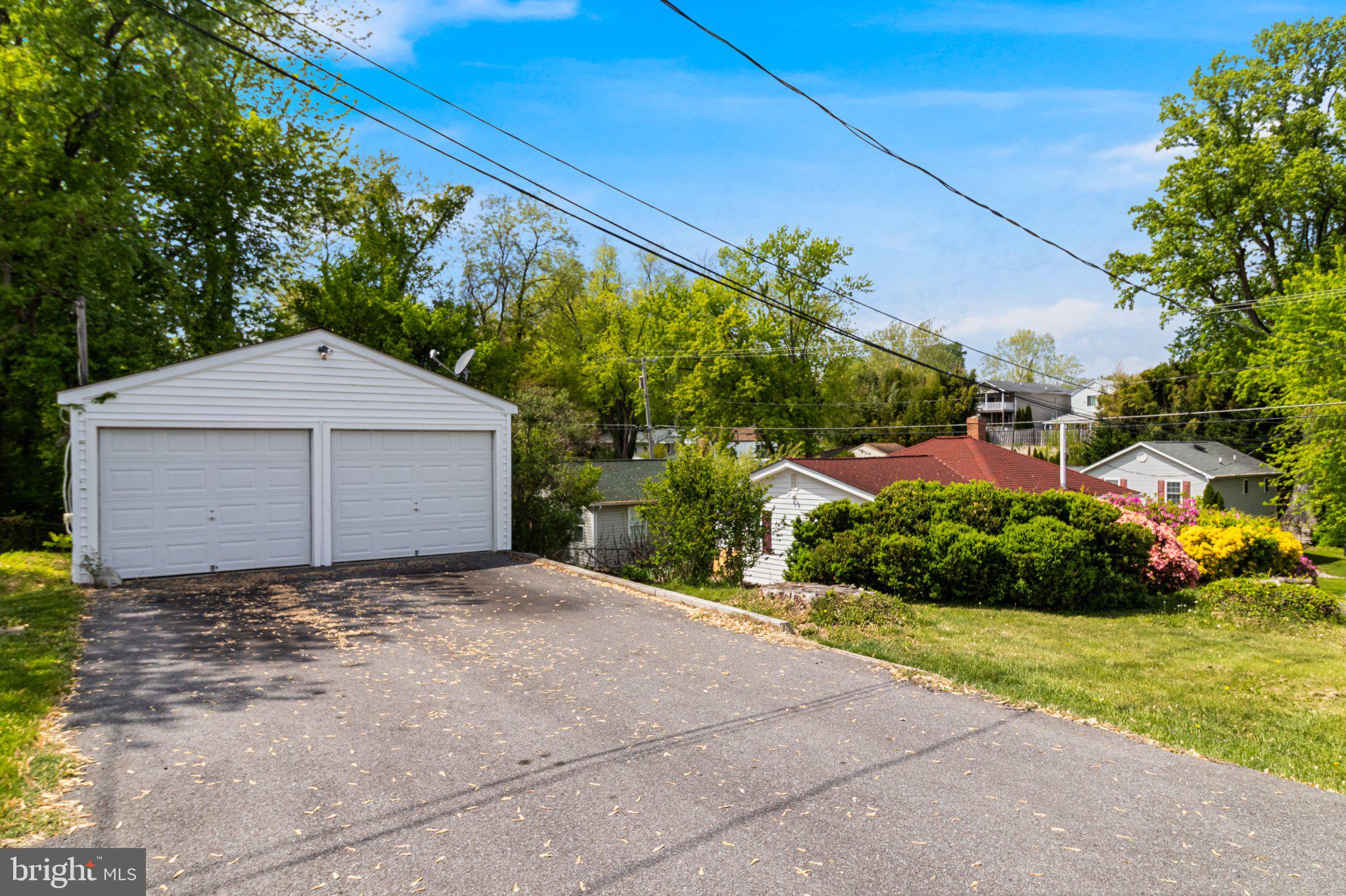 3925 Old Bayside Road Chesapeake Beach, MD 20732 - Photo 2 of 15 Charming homes nestled in greenery.
