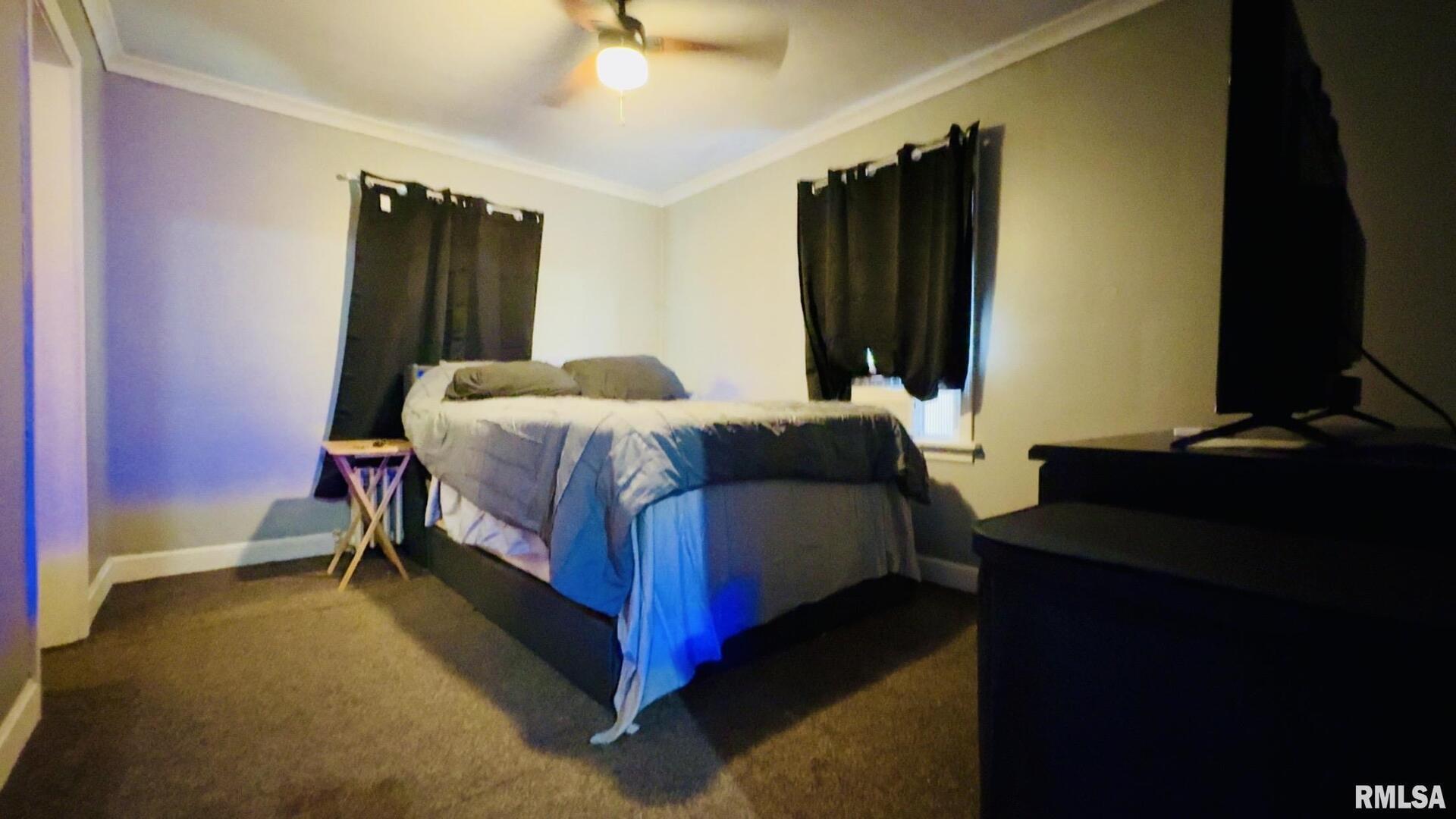 419 East Church Street Benton, IL 62812 - Photo 15 of 16 a bedroom with a bed and a dresser