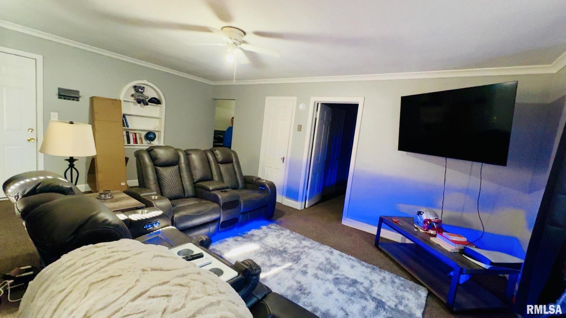 419 East Church Street Benton, IL 62812 - Photo 10 of 16 a living room with furniture and a flat screen tv