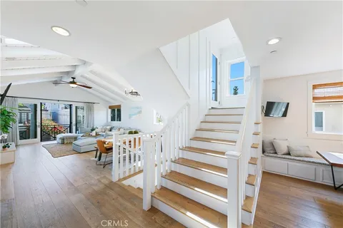 a bedroom with bed and a window