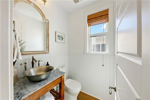 a bedroom with a bed and a cabinets