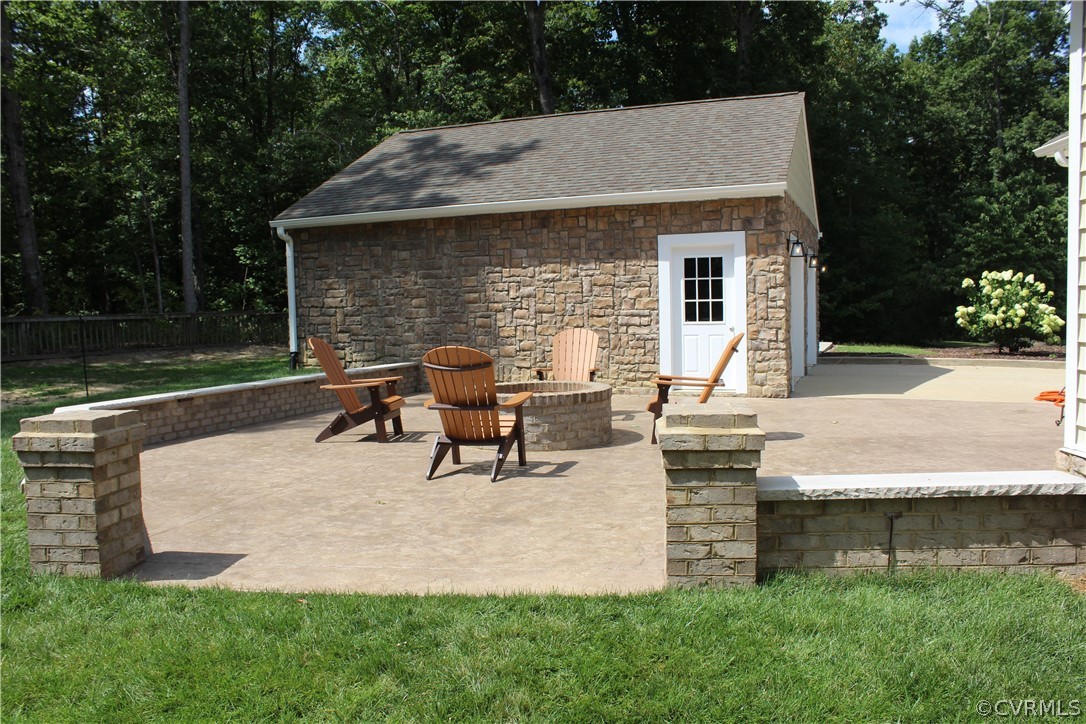 7351 Tate Road Ruther Glen, VA 22546 - Photo 5 of 50 Stamped Concrete Patio w/Stone surround approximat