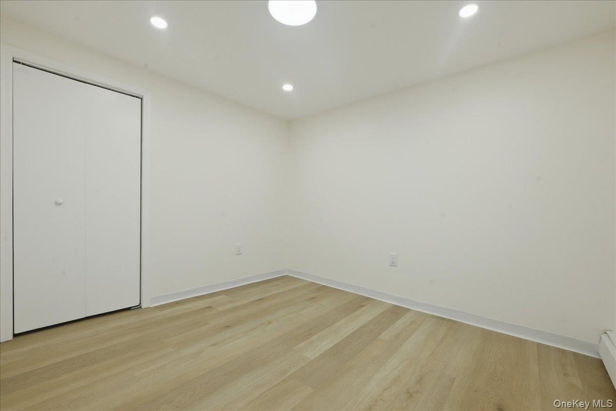 84 North Fordham Road Hicksville, NY 11801 - Photo 24 of 28 a view of an empty room