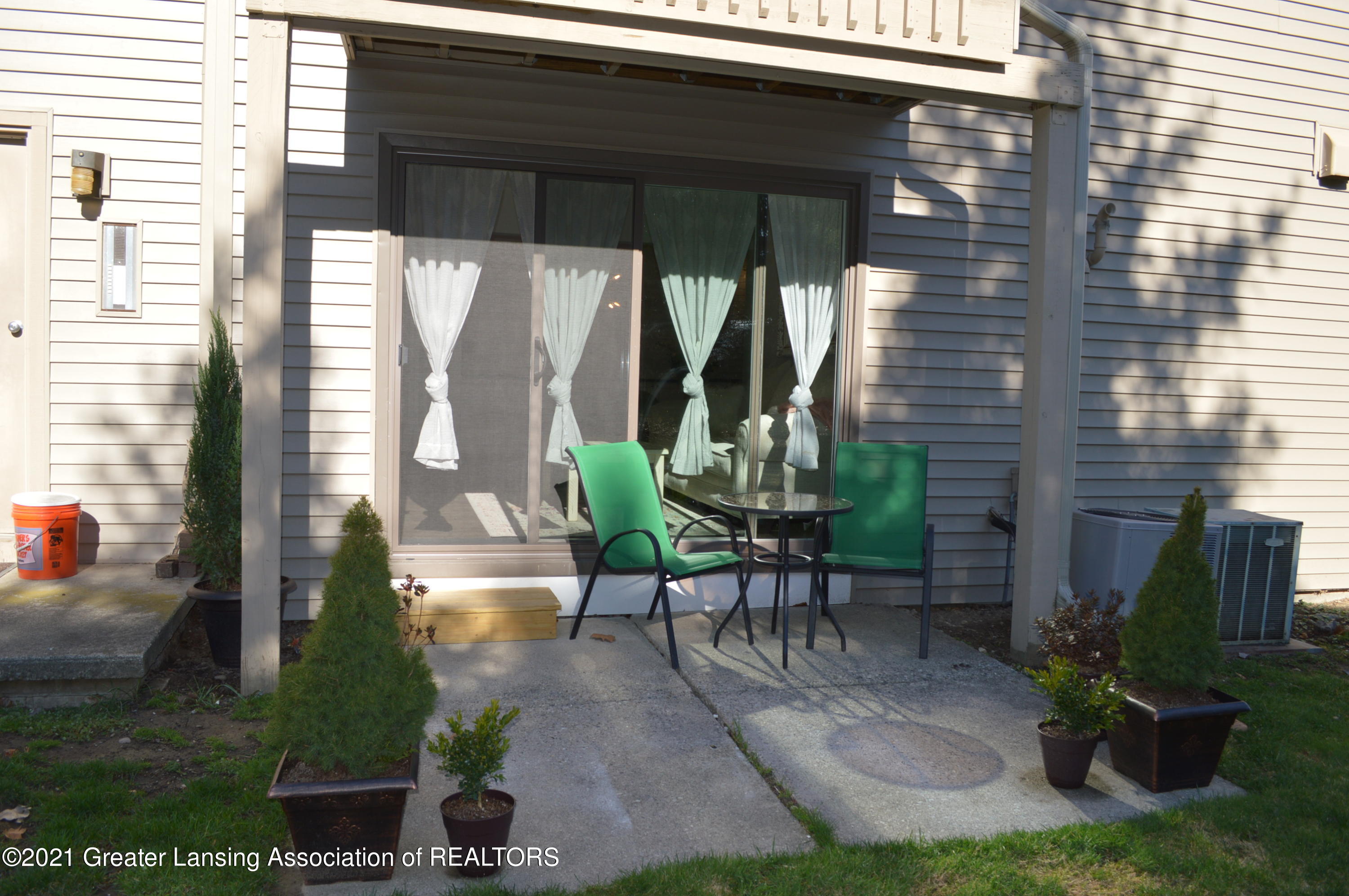 5400 Maple Ridge Road, Unit 11 Haslett, MI 48840 - Photo 21 of 24 Patio (2)