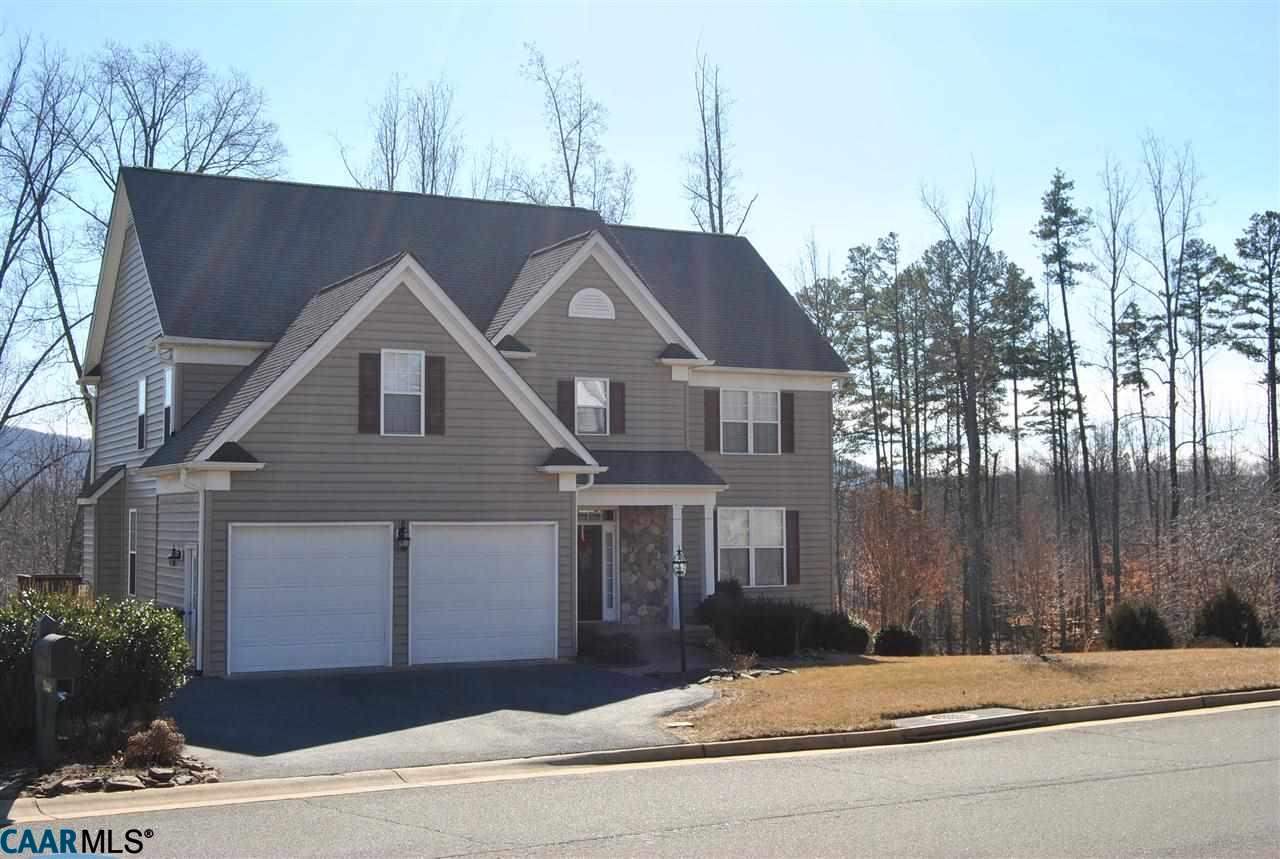 1860 Rhett Court Charlottesville, VA 22903 - Photo 1 of 39 a house that has a tree in front of it
