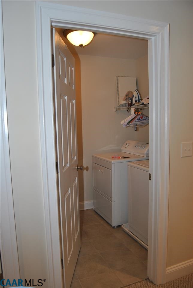 1860 Rhett Court Charlottesville, VA 22903 - Photo 30 of 39 a bathroom with a sink and mirror