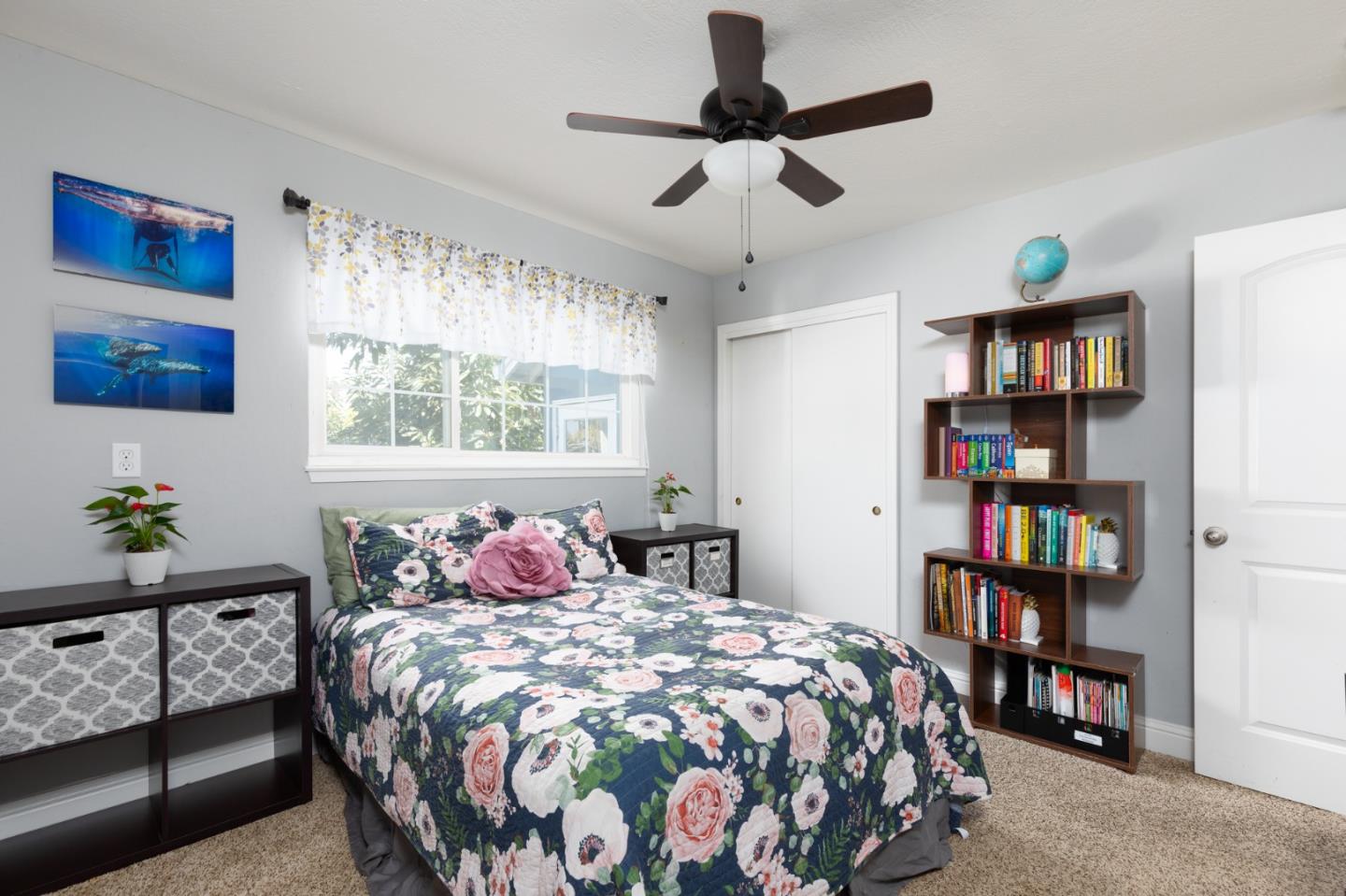 1446 Sharp Avenue Campbell, CA 95008 - Photo 14 of 22 a bedroom with a bed a dresser and a book shelf
