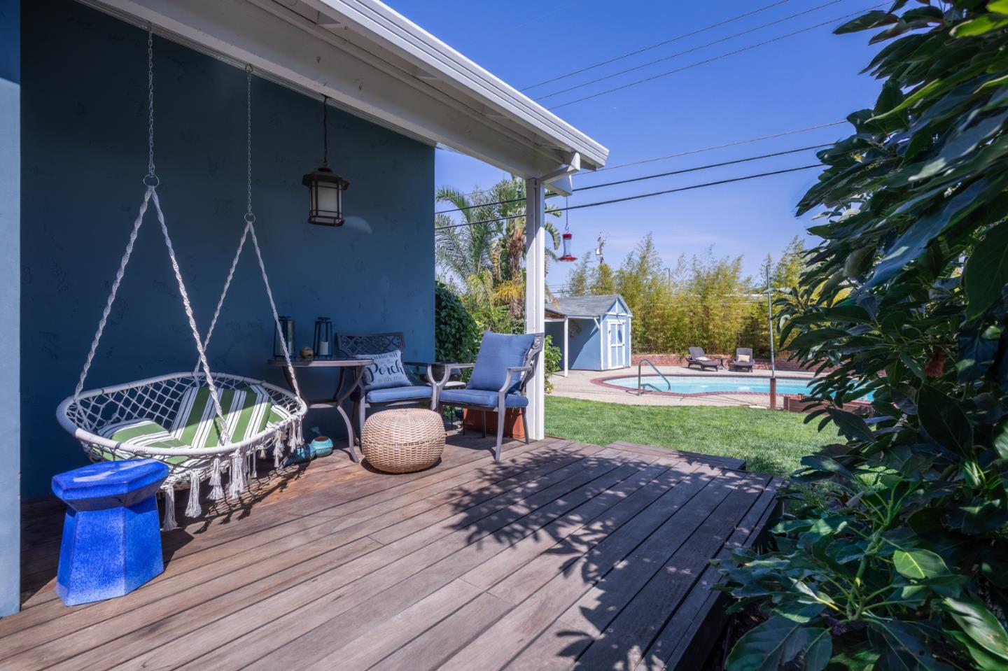 1446 Sharp Avenue Campbell, CA 95008 - Photo 18 of 22 a view of a patio with table and chairs potted plants and a palm tree