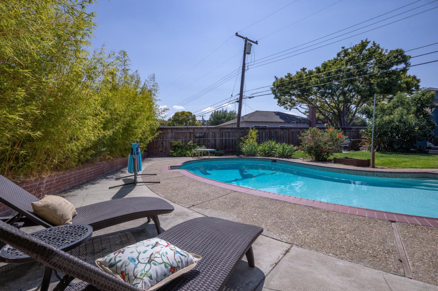 1446 Sharp Avenue Campbell, CA 95008 - Photo 20 of 22 a view of a patio with a table chairs and a fire pit