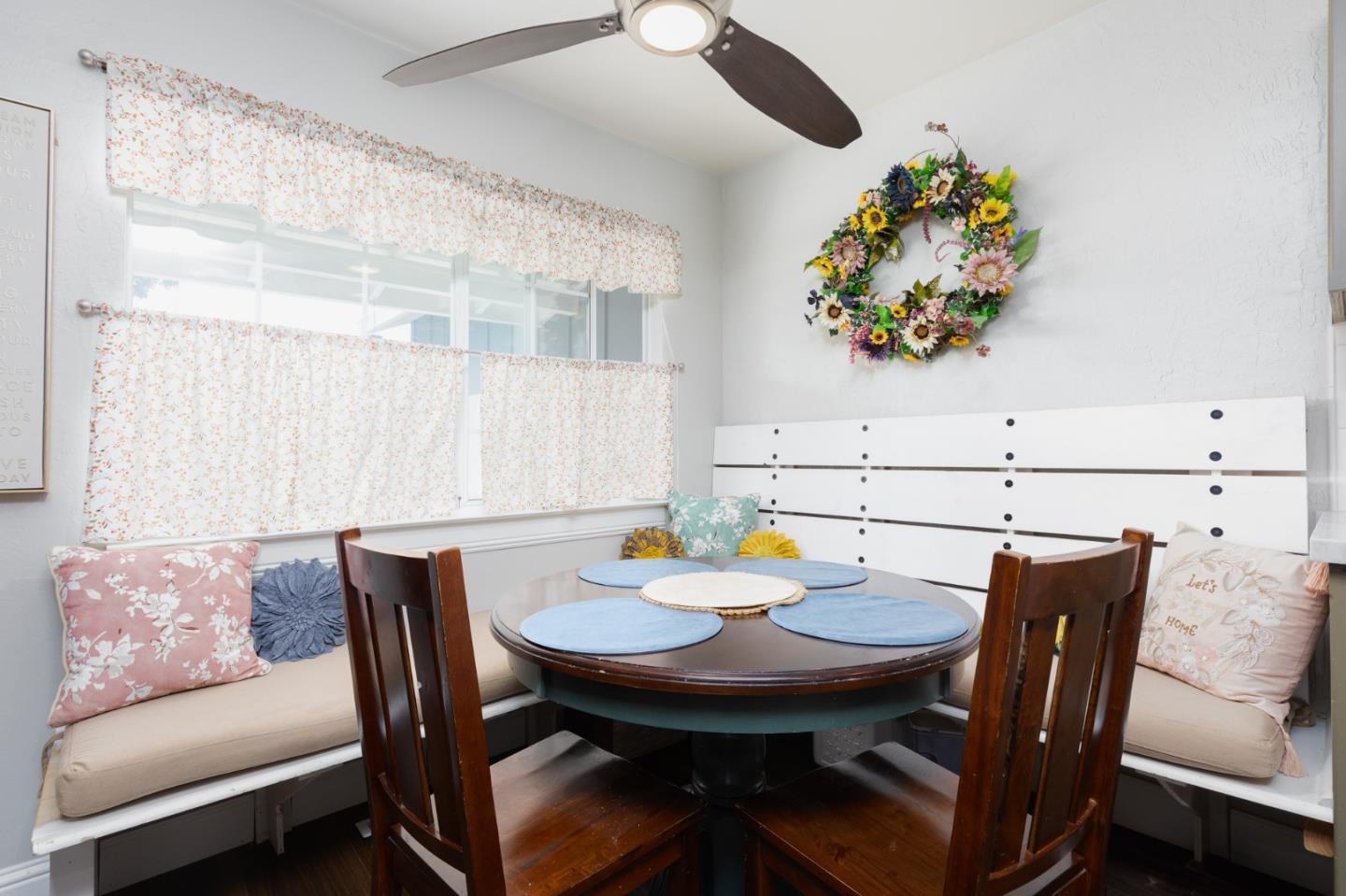 1446 Sharp Avenue Campbell, CA 95008 - Photo 3 of 22 a view of a dining room with furniture a chandelier and wooden floor