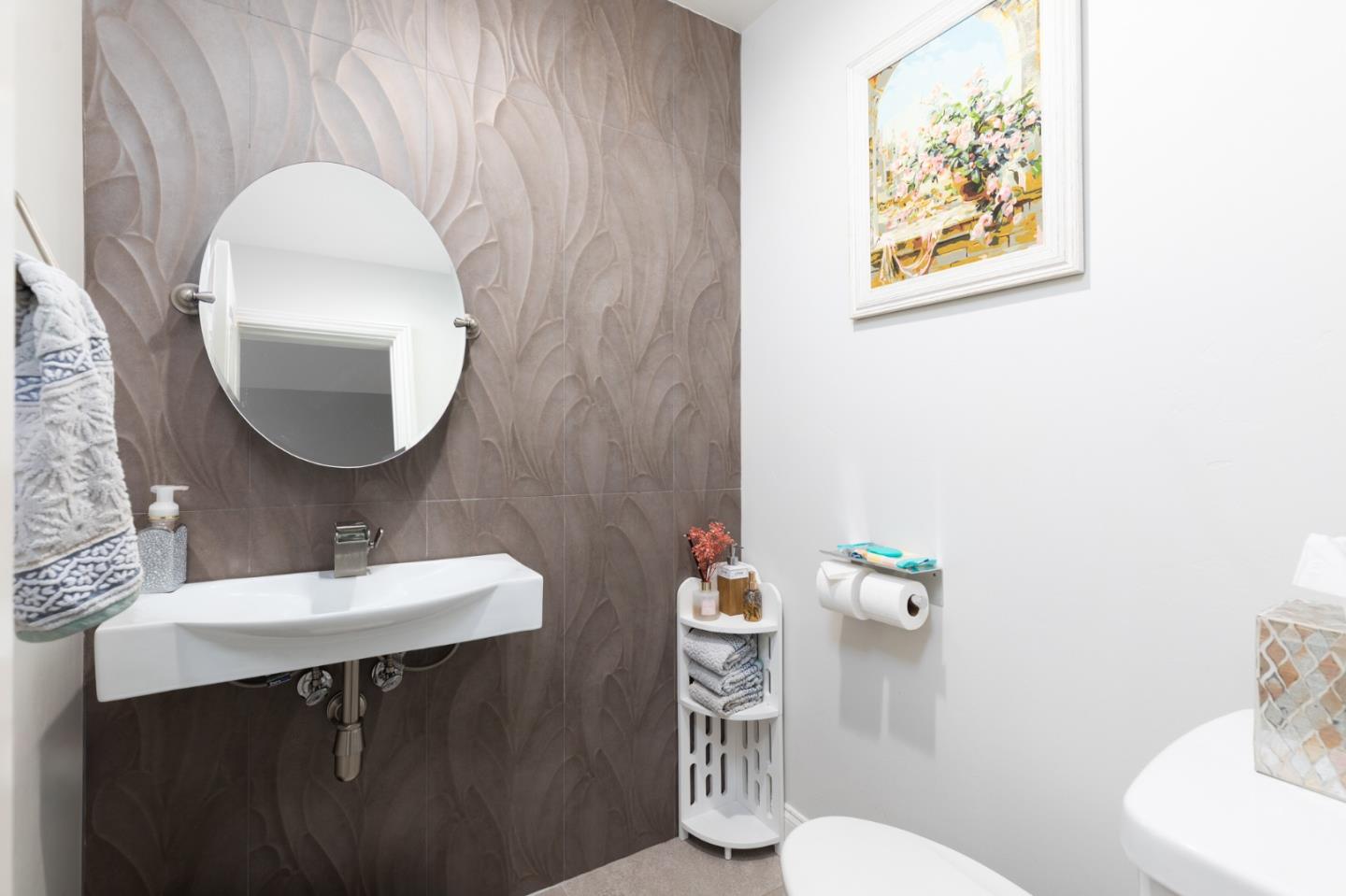 1446 Sharp Avenue Campbell, CA 95008 - Photo 6 of 22 a bathroom with a sink mirror and toilet