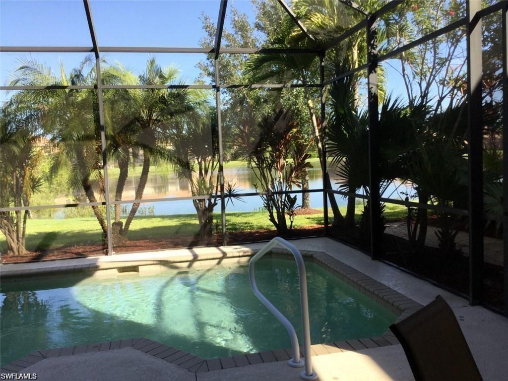 20085 Larino Loop Estero, FL 33928 - Photo 1 of 29 Private pool with view on the lake