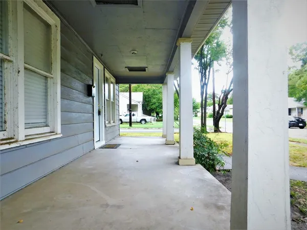 a view of backyard and porch
