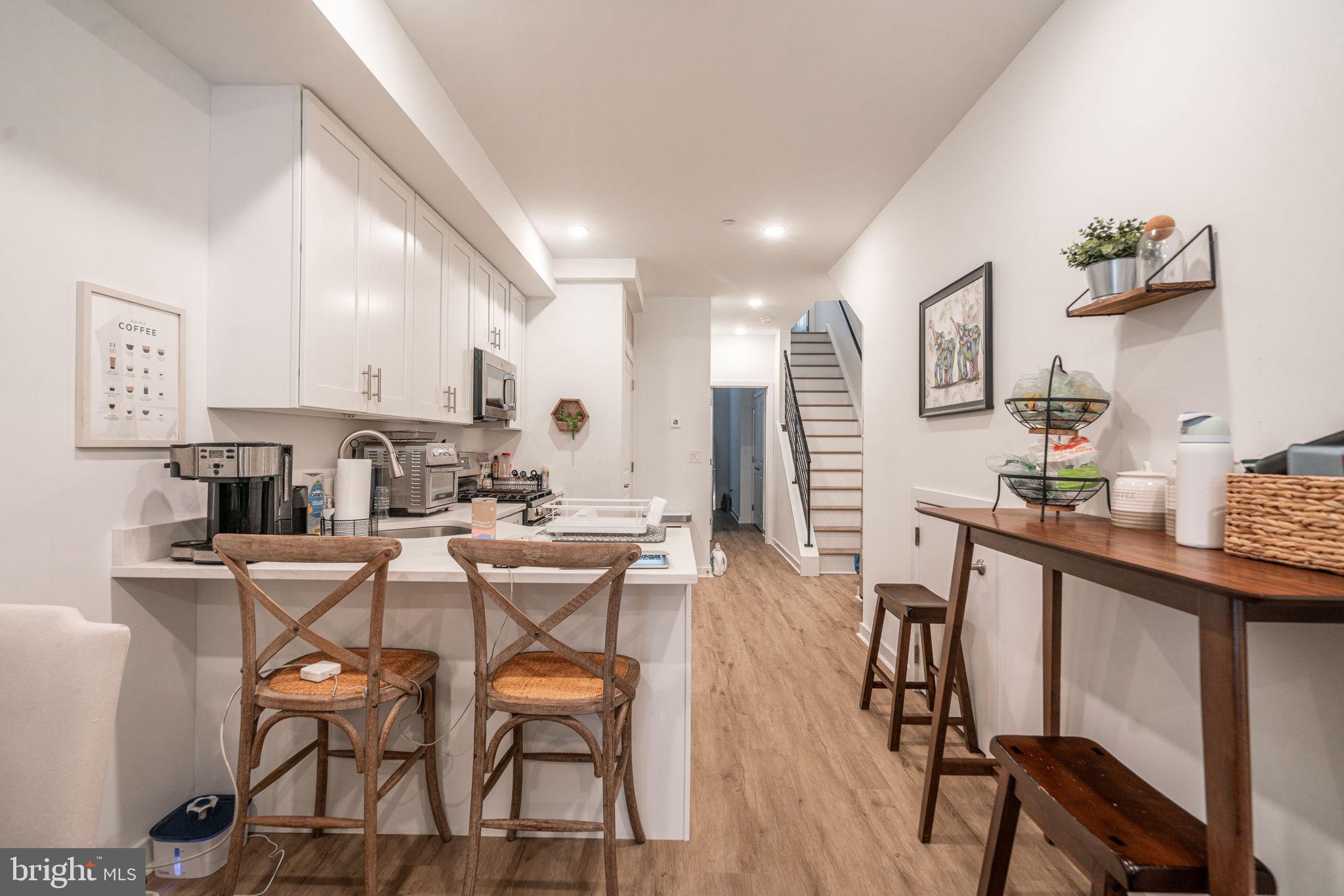 2613 Federal Street Philadelphia, PA 19146 - Photo 11 of 18 a view of a dining room with furniture and wooden floor