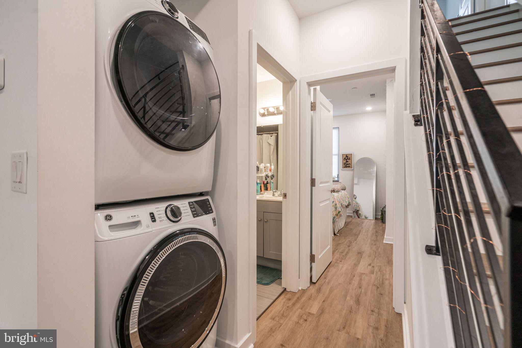 2613 Federal Street Philadelphia, PA 19146 - Photo 12 of 18 a view of a hallway with washer and dryer