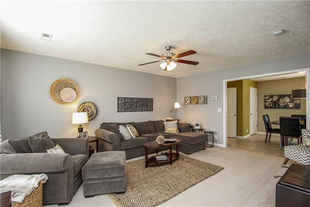 1042 Woodall Road Lebanon, TN 37090 - Photo 3 of 16 a living room with furniture and a table