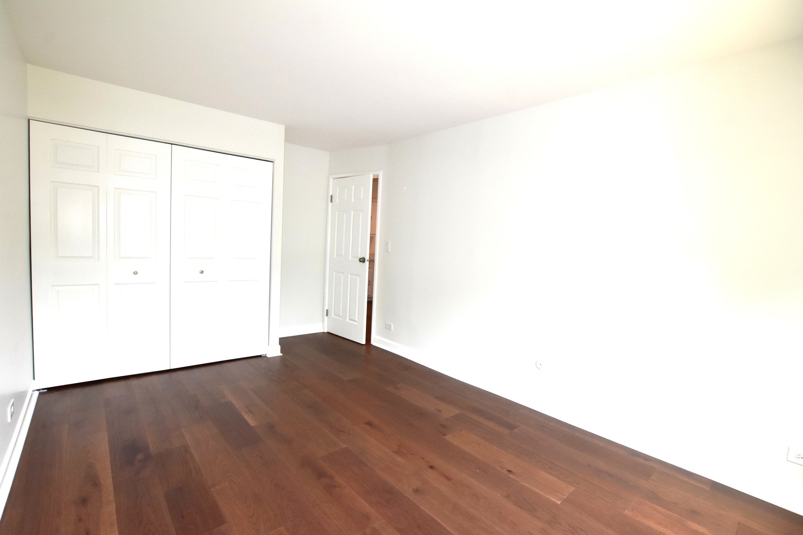 500 West Huntington Commons Road, Unit 157 Mount Prospect, IL 60056 - Photo 18 of 24 a view of an empty room