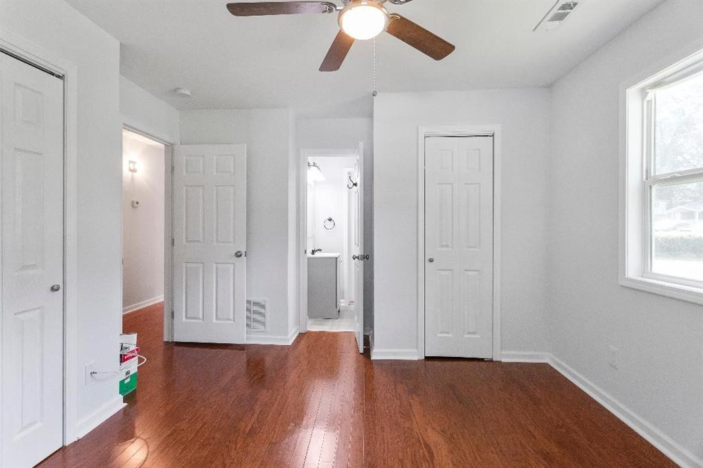 4144 Canby Lane Decatur, GA 30035 - Photo 2 of 6 a view of empty room with wooden floor and fan