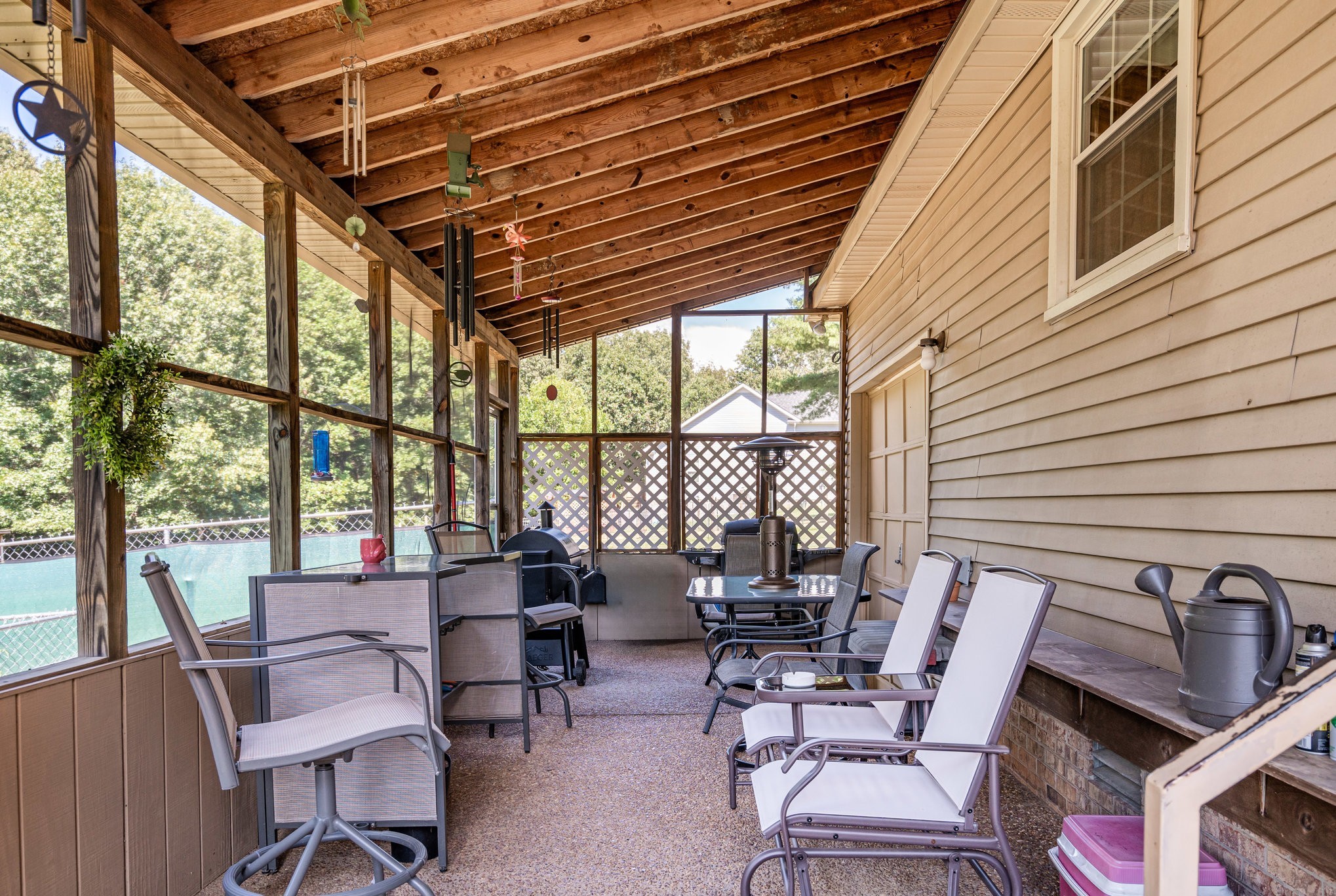 8049 New Chapel Road Springfield, TN 37172 - Photo 15 of 20 a building outdoor space with patio furniture and potted plants