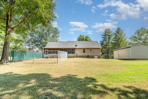 a house view with a garden space