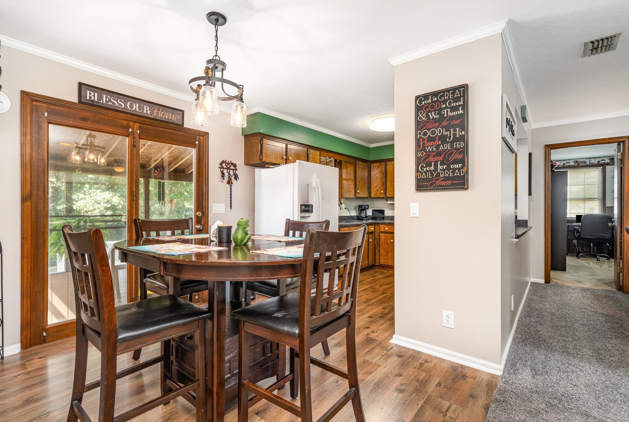 8049 New Chapel Road Springfield, TN 37172 - Photo 5 of 20 a view of a dining room with furniture window and wooden floor