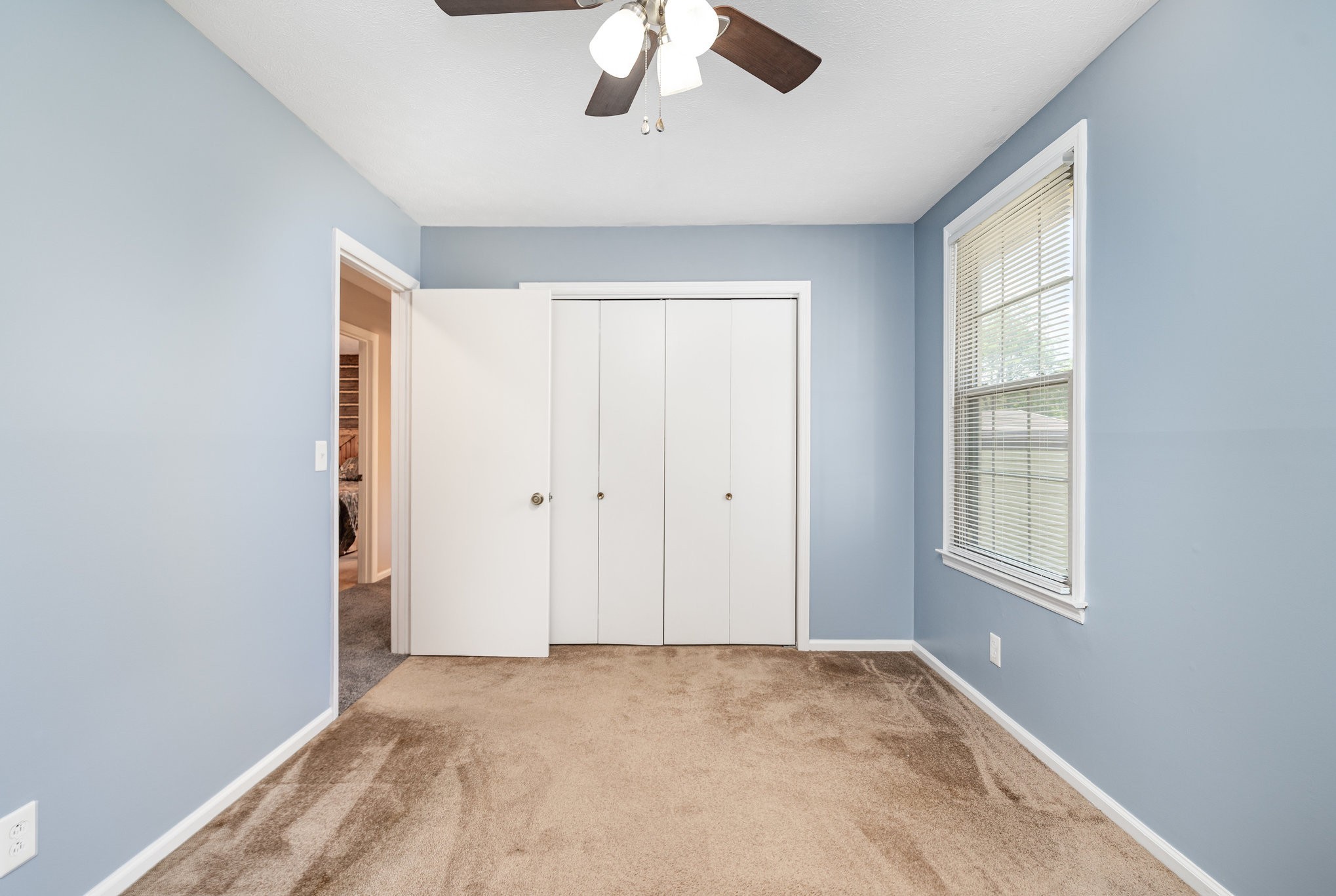 8049 New Chapel Road Springfield, TN 37172 - Photo 8 of 20 a view of an empty room with a window