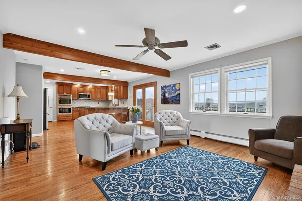 a living room with furniture and a rug