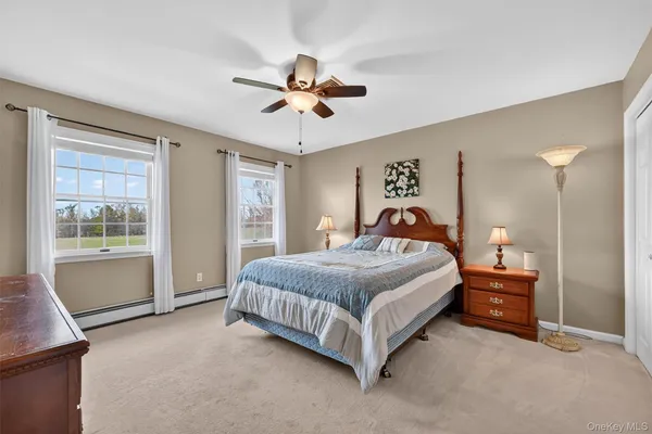 a bed room with a bed and a window